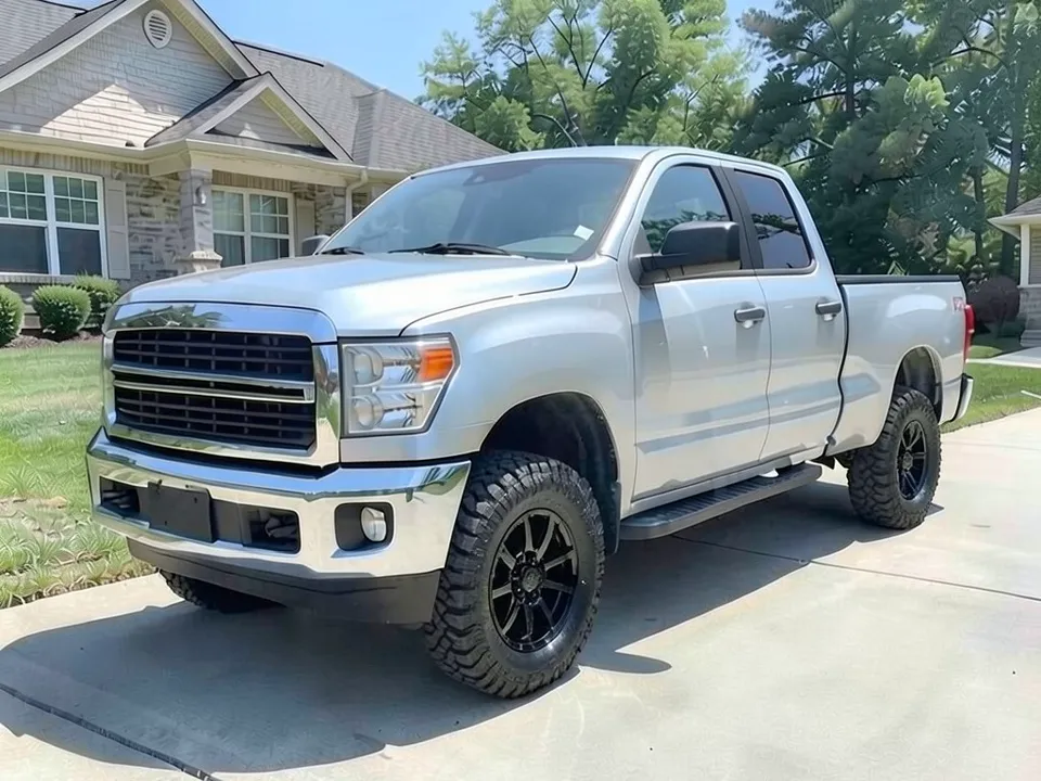 AI-drawn sample: the same pickup on gloss black multi-spoke wheels with taller, blocky off-road tires
