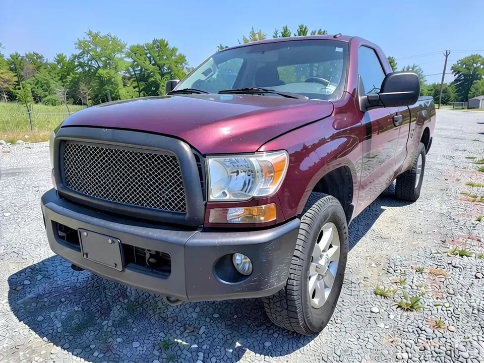 AI-drawn sample: a maroon pickup truck on a gravel lot seen from a front corner