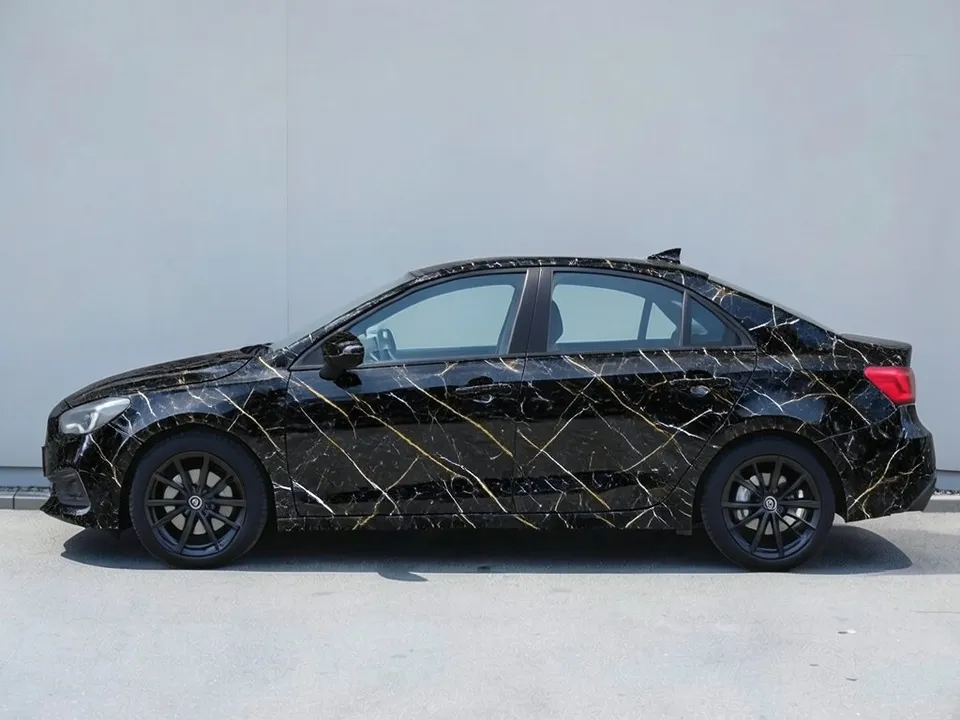 AI-drawn sample: the same sedan in a black marble wrap with gold veins