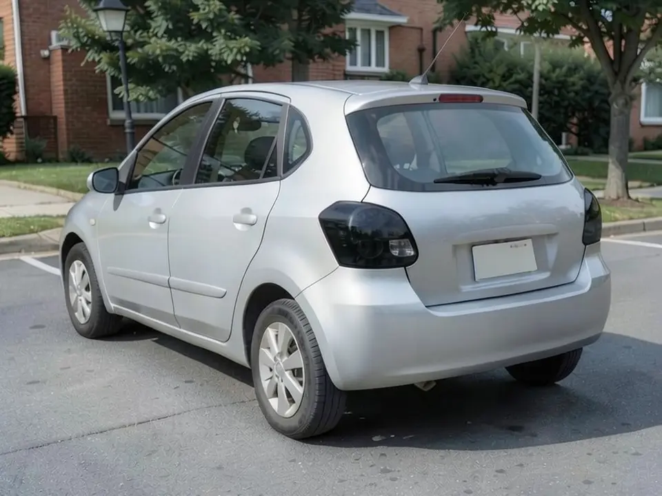 AI-drawn sample: the same hatchback with both tail lights changed to a near-black smoked tint