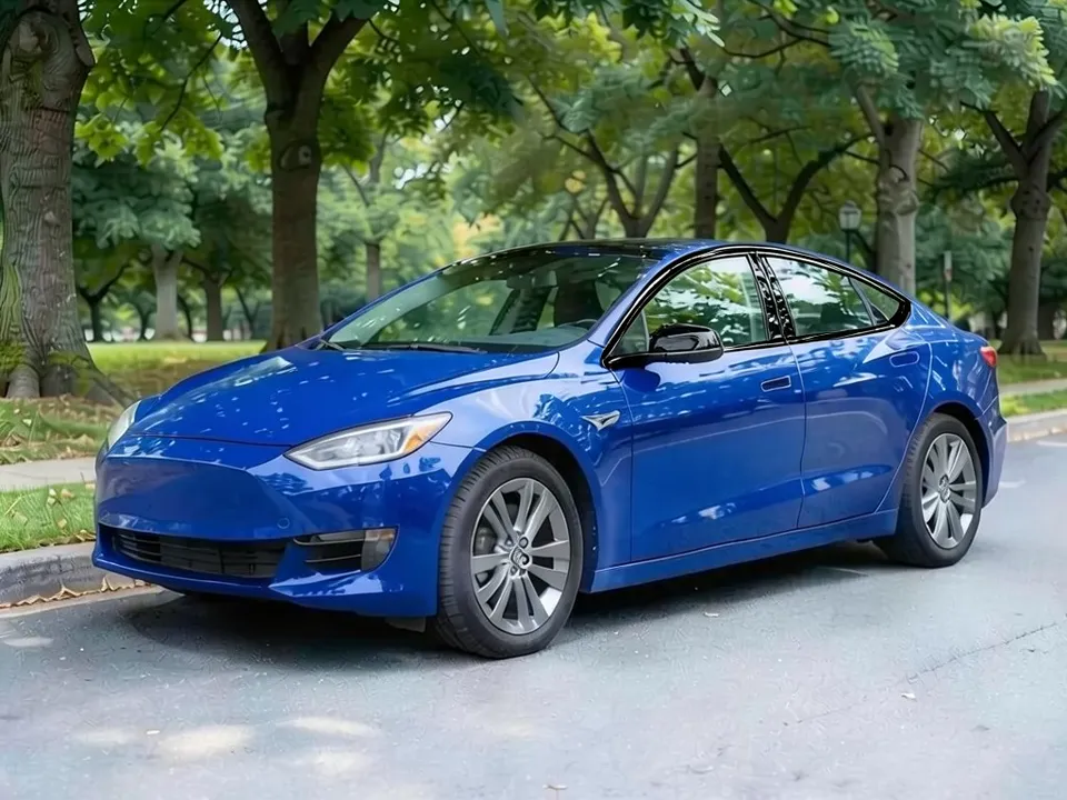 AI-generated sample: the same blue sedan after a second edit, with the trim around the side windows now gloss black
