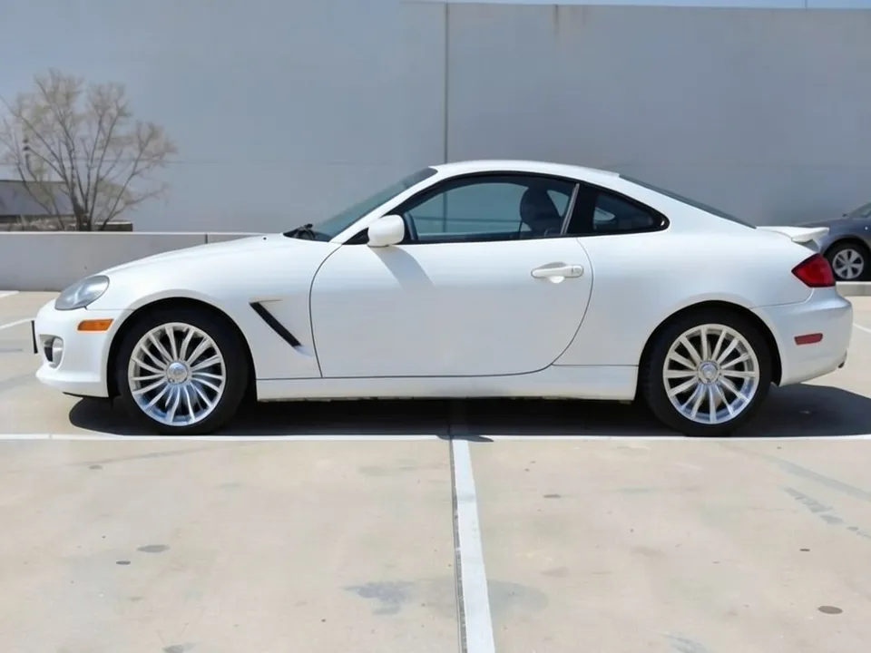 AI-drawn sample: the same coupe on silver turbine-style wheels with many thin curved spokes