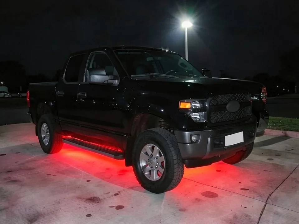 AI-drawn sample: the same pickup with red underglow lighting the concrete beneath it