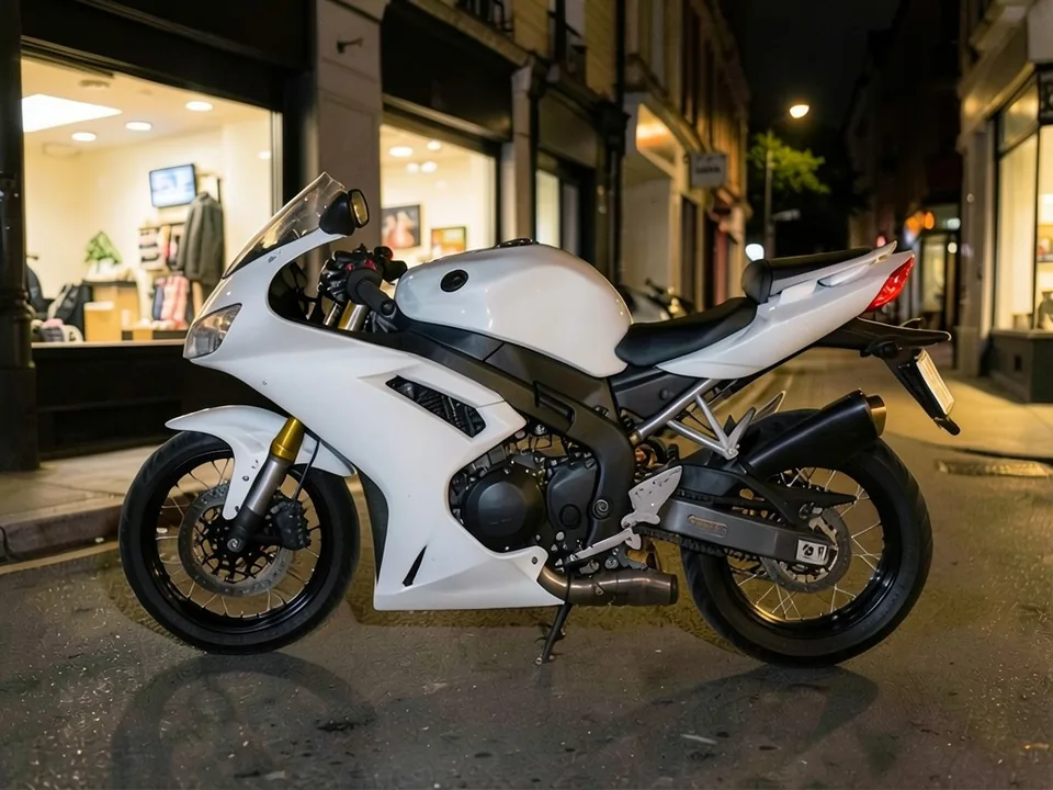 AI-drawn sample: a white sport motorcycle parked on a city street at night in front of lit shop windows