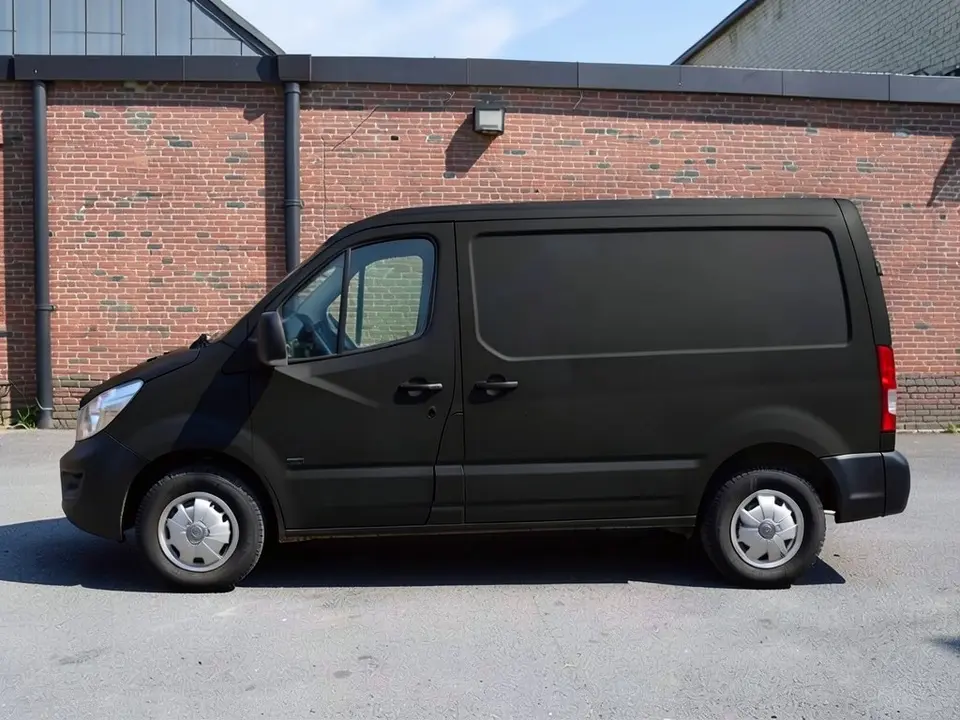 AI-drawn sample: the same van in a matte black wrap look